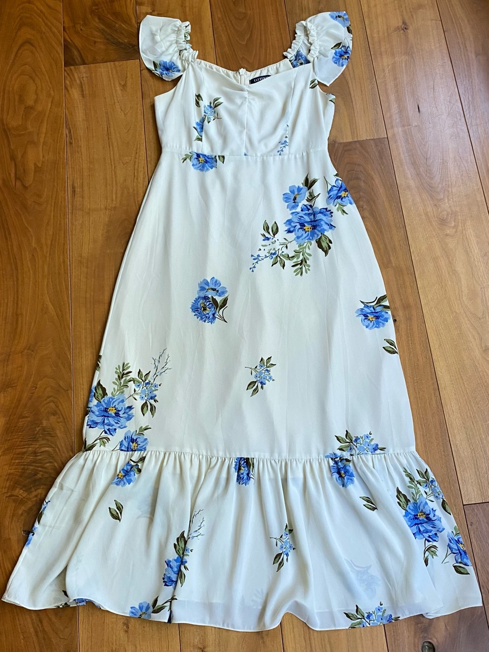 Creamy White and Blue Floral Ruffle Hem Maxi Dress